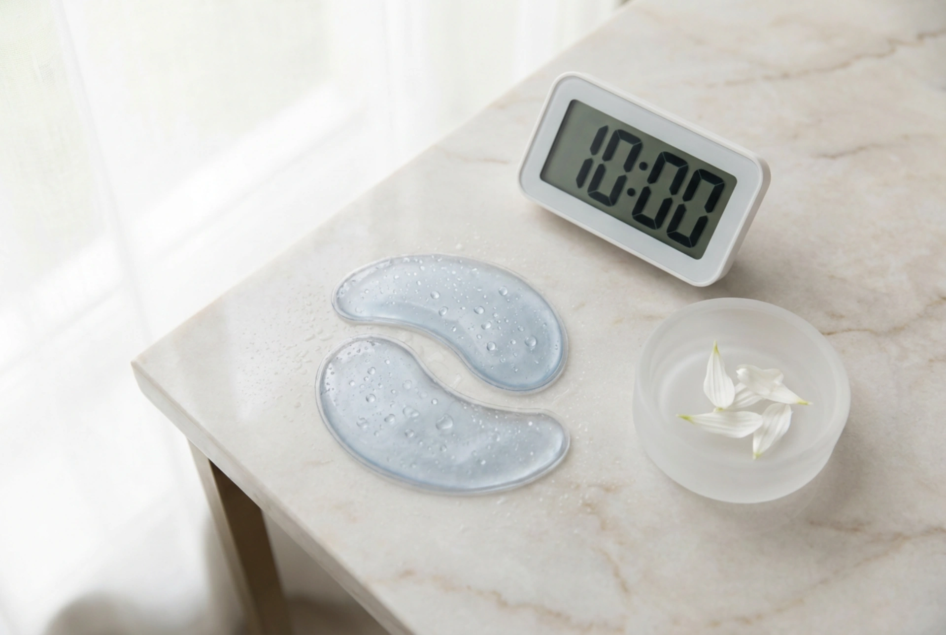 Oogmaskers en -pads: koelen, aanbrengen en inwerktijd